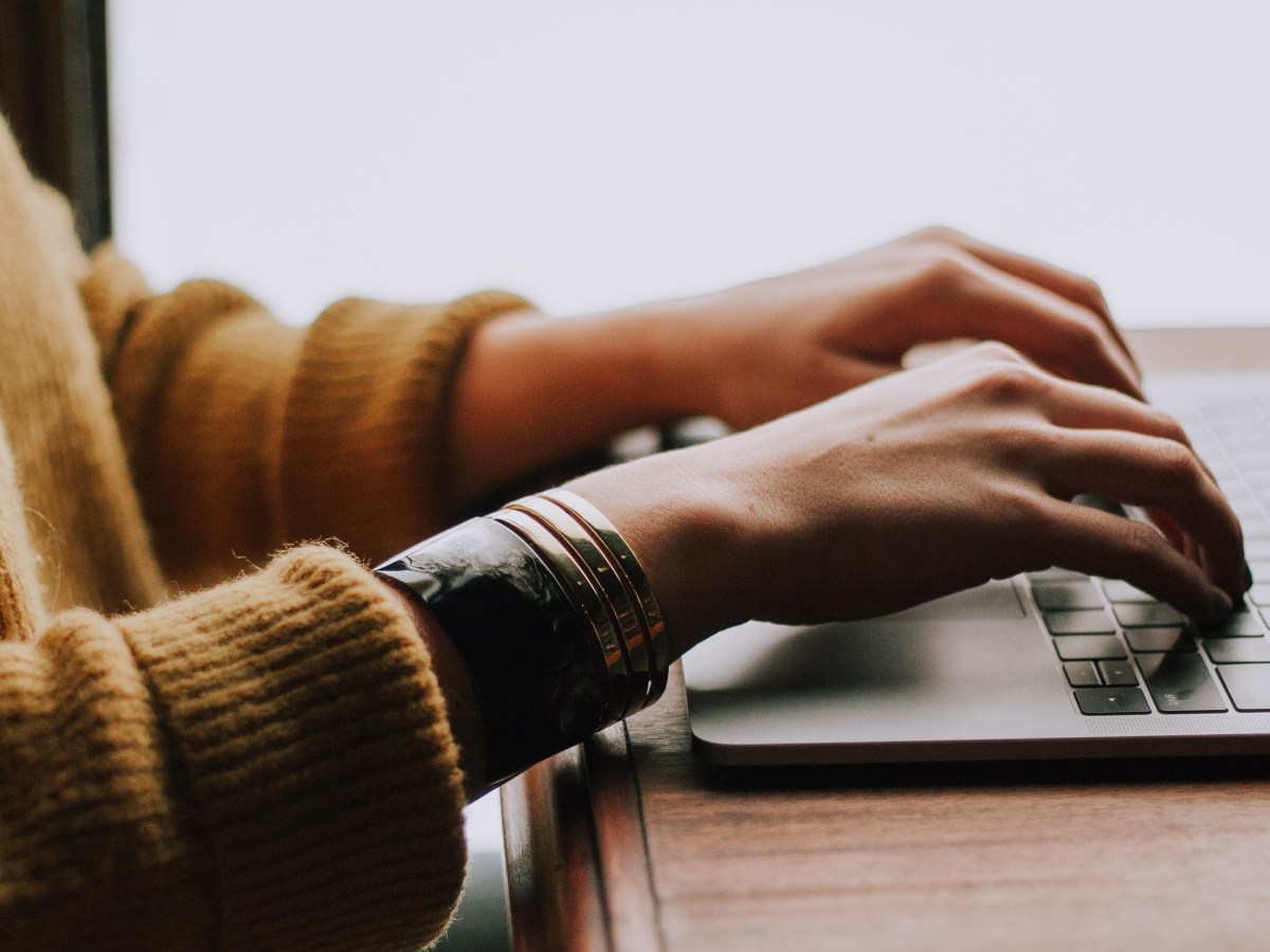 A person using a laptop computer